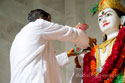 Pujya Deepakhai Tying Rakhi to Lord Shri Krishna